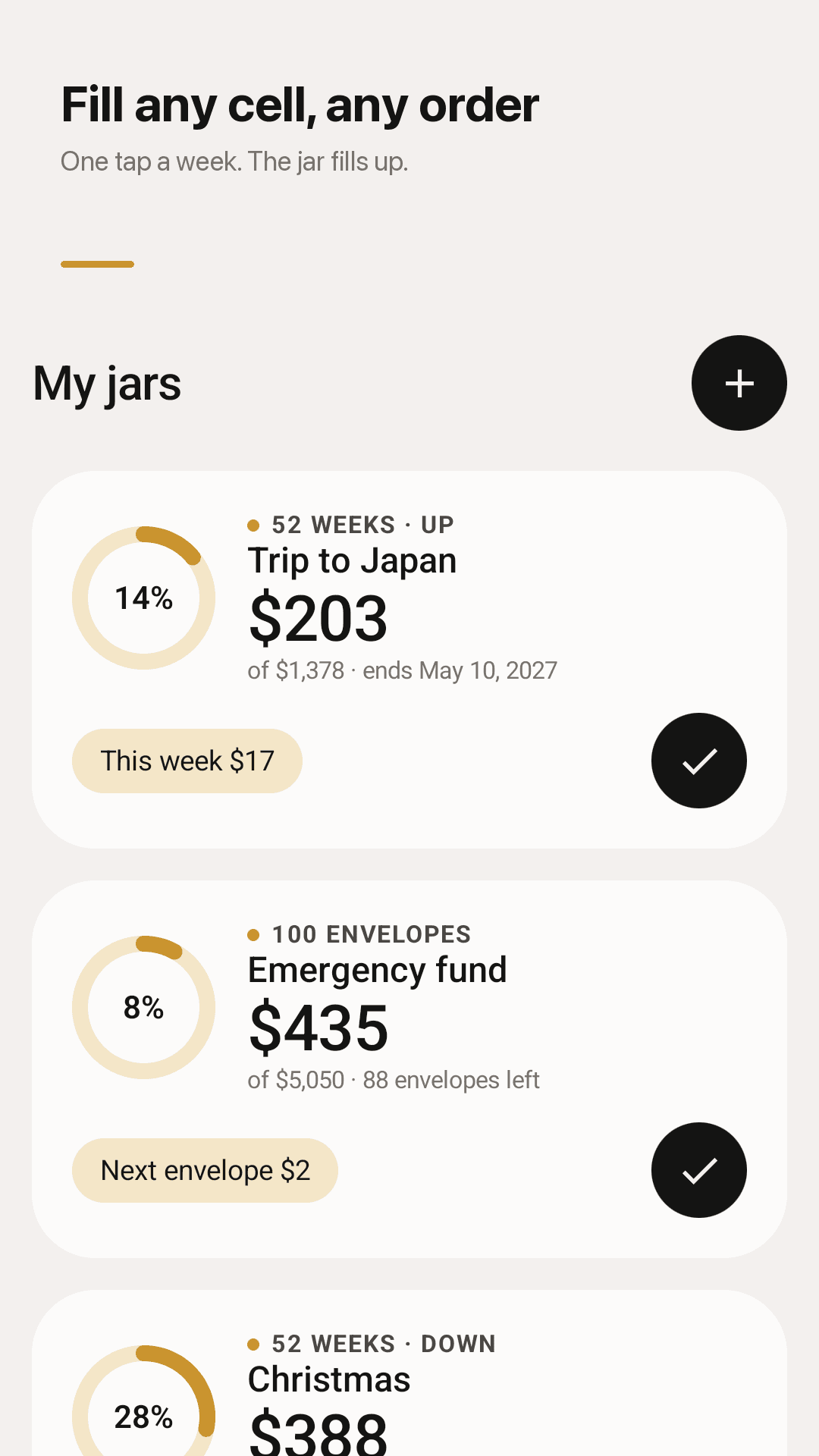 Weekjar home screen — a Trip to Japan 52 week challenge at 14%, this week's cell $17, and a 100 envelope emergency fund